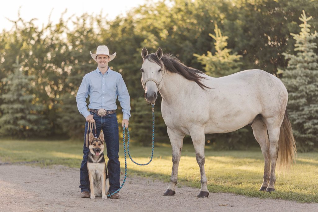 western cowboy with horse and dog